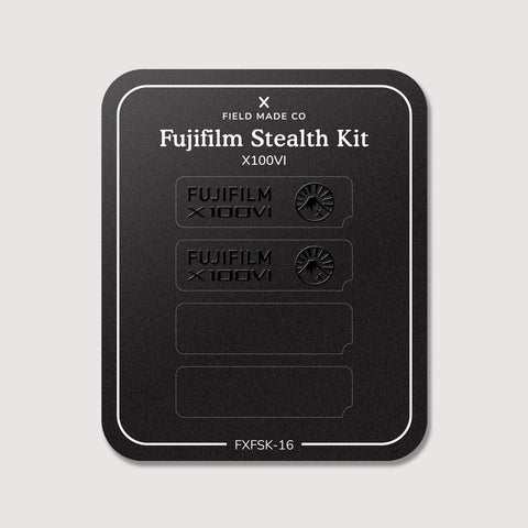 Stealth Kit for Fujifilm X100 VI: Ghost Logo and Plain Black vinyl labels on the Field Made Co backing sheet