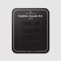 Stealth Kit for Fujifilm X100 V: Ghost Logo and Plain Black vinyl labels on the Field Made Co backing sheet